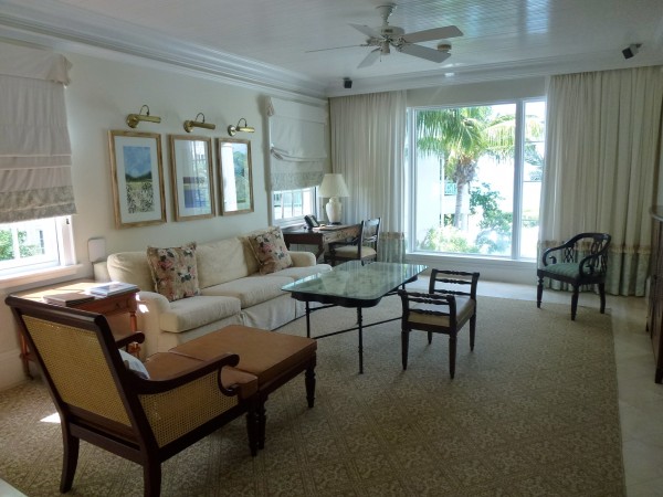 Living room area in One Bedroom Oceanview Suite at Regent Palms