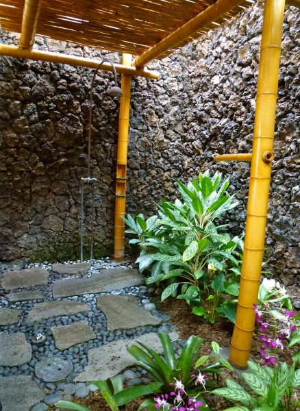 Volcanic rock outdoor shower at Four Seasons Hualalai