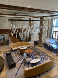 the interior of a luxury hotel with chandeliers
