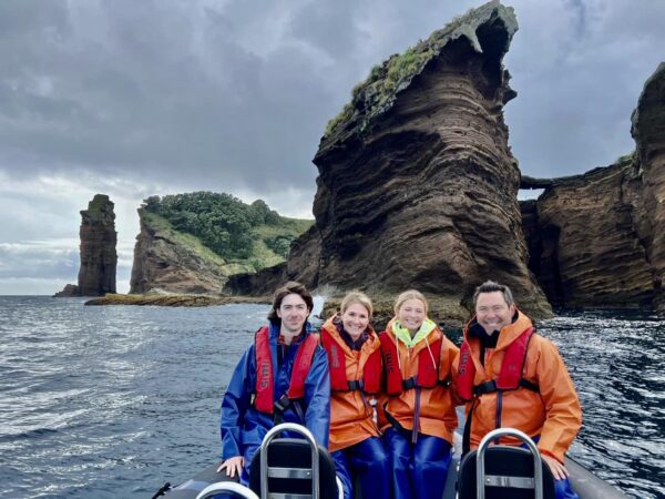Family of four on a water adventure in The Azores, Portugal
